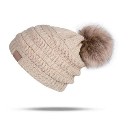 Women's knitted beanie hat, stylish and warm for winter.