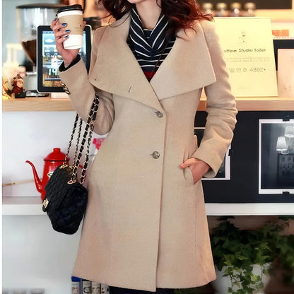 Winter cashmere long coat for women, offering warmth and style.