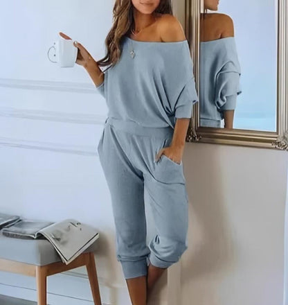 Trendy off-the-shoulder long sleeve pullover in a chic and comfortable design