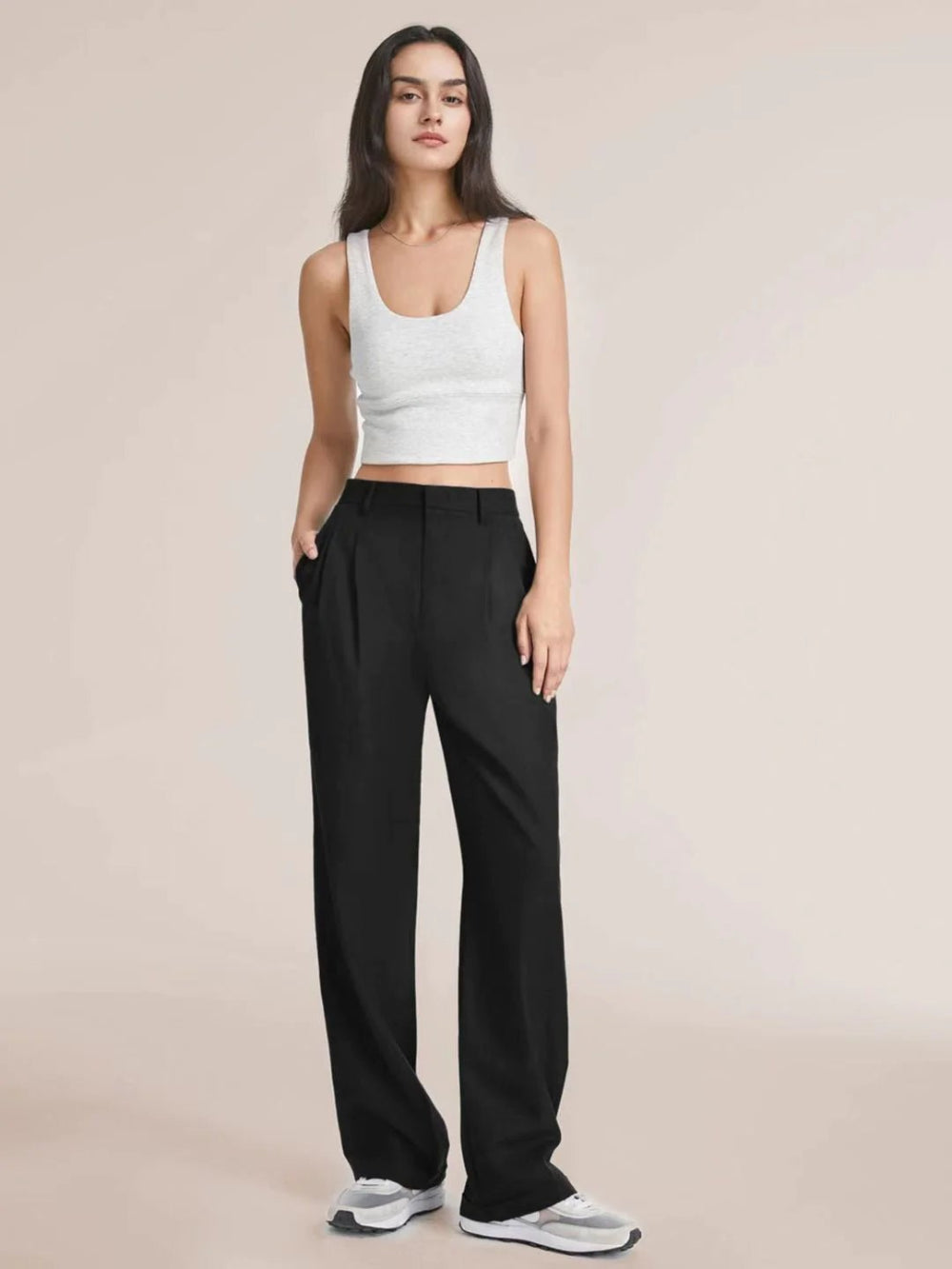 Chic wide-leg trousers with pockets and a slimming high-waist design.