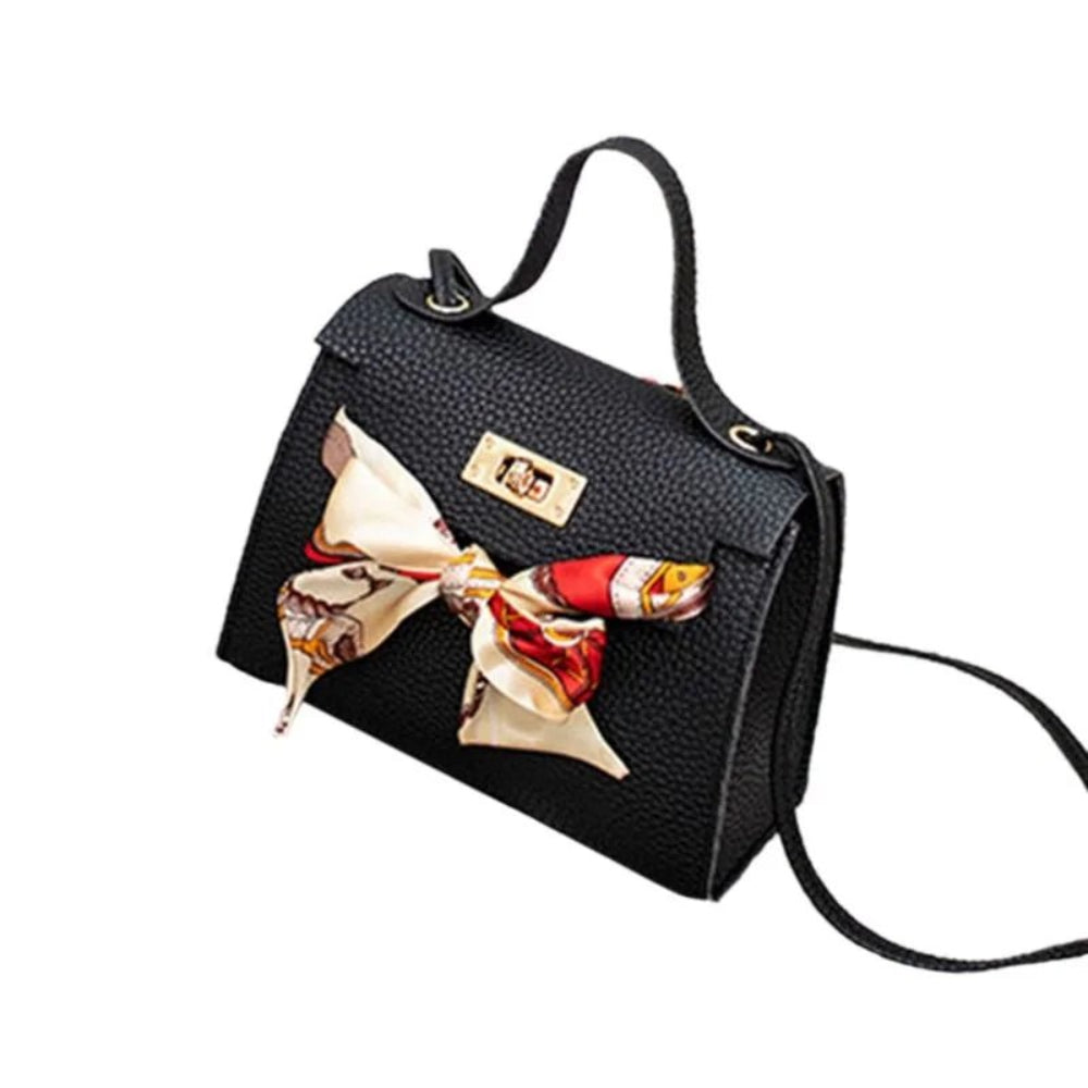 Leather handbag with scarf for an elegant and stylish look.