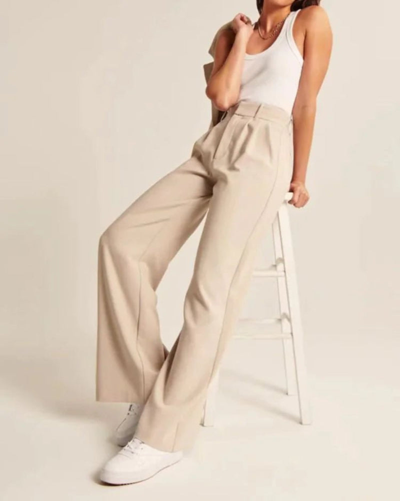 Chic wide-leg trousers with pockets and a slimming high-waist design.